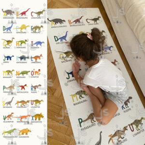 Alfombra infantil de juego playmat con dibujos de dinosaurios.
